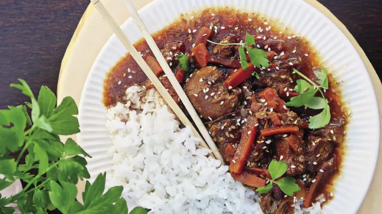 Hot turkey meatballs in sauce with rice.